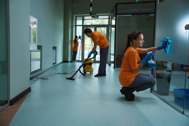 Cleaning team maintaining a commercial workplace